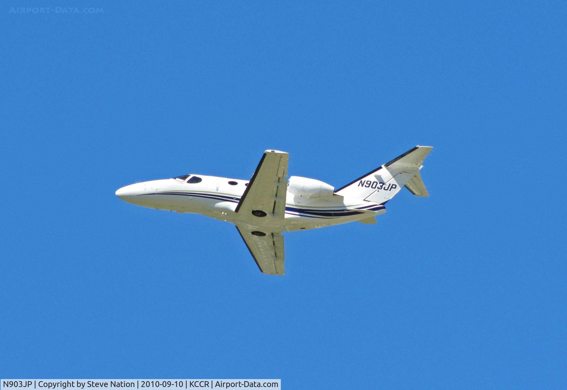 N903JP, 2008 Cessna 510 Citation Mustang C/N 510-0102, Promag Retail Services 2008 Cessna 510 climbs out from RWY19L from home base