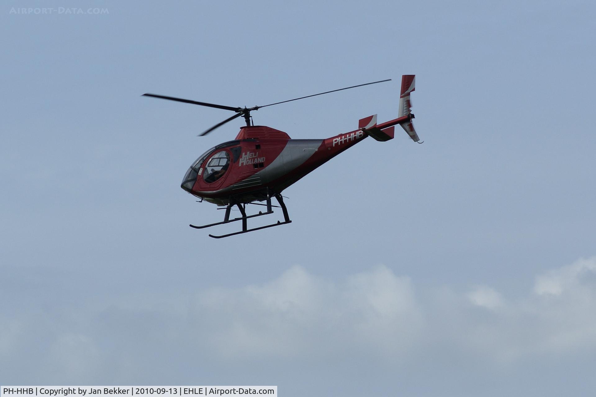 PH-HHB, Schweizer 269D C/N 0016, Just flying over Lelystad Airport