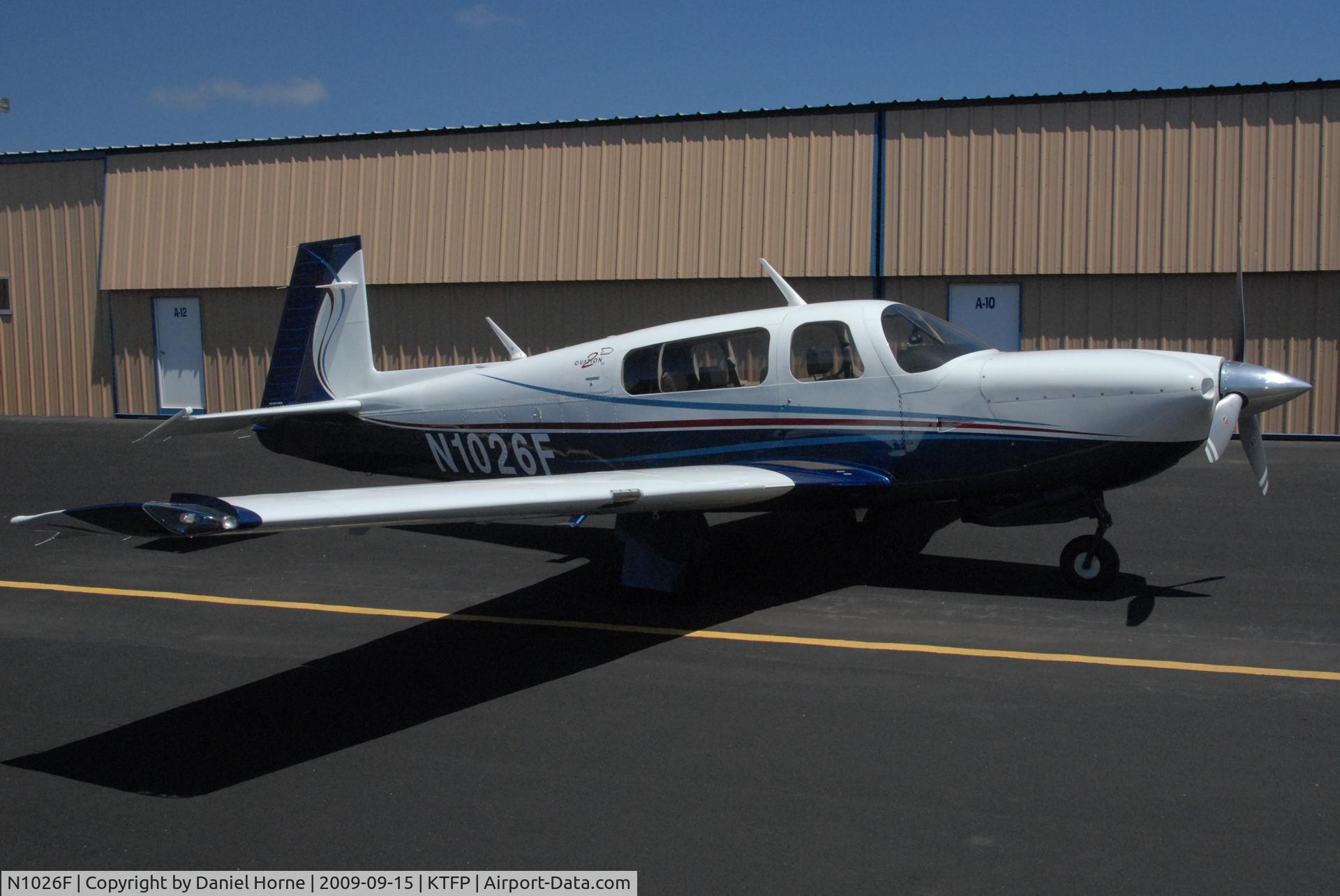 N1026F, 2004 Mooney M20R Ovation C/N 29-0326, N1026F in front of its hangar in Portland texas