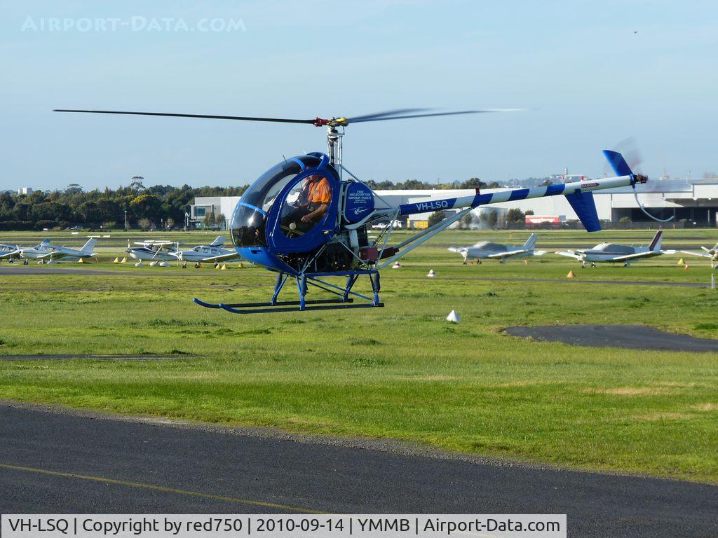 VH-LSQ, 1991 Schweizer 269C C/N S1559, VH-LSQ just airborne to air taxi to the southern helipad for departure. The aircraft has been repainted a slightly darker shade of blue since my previous photo.