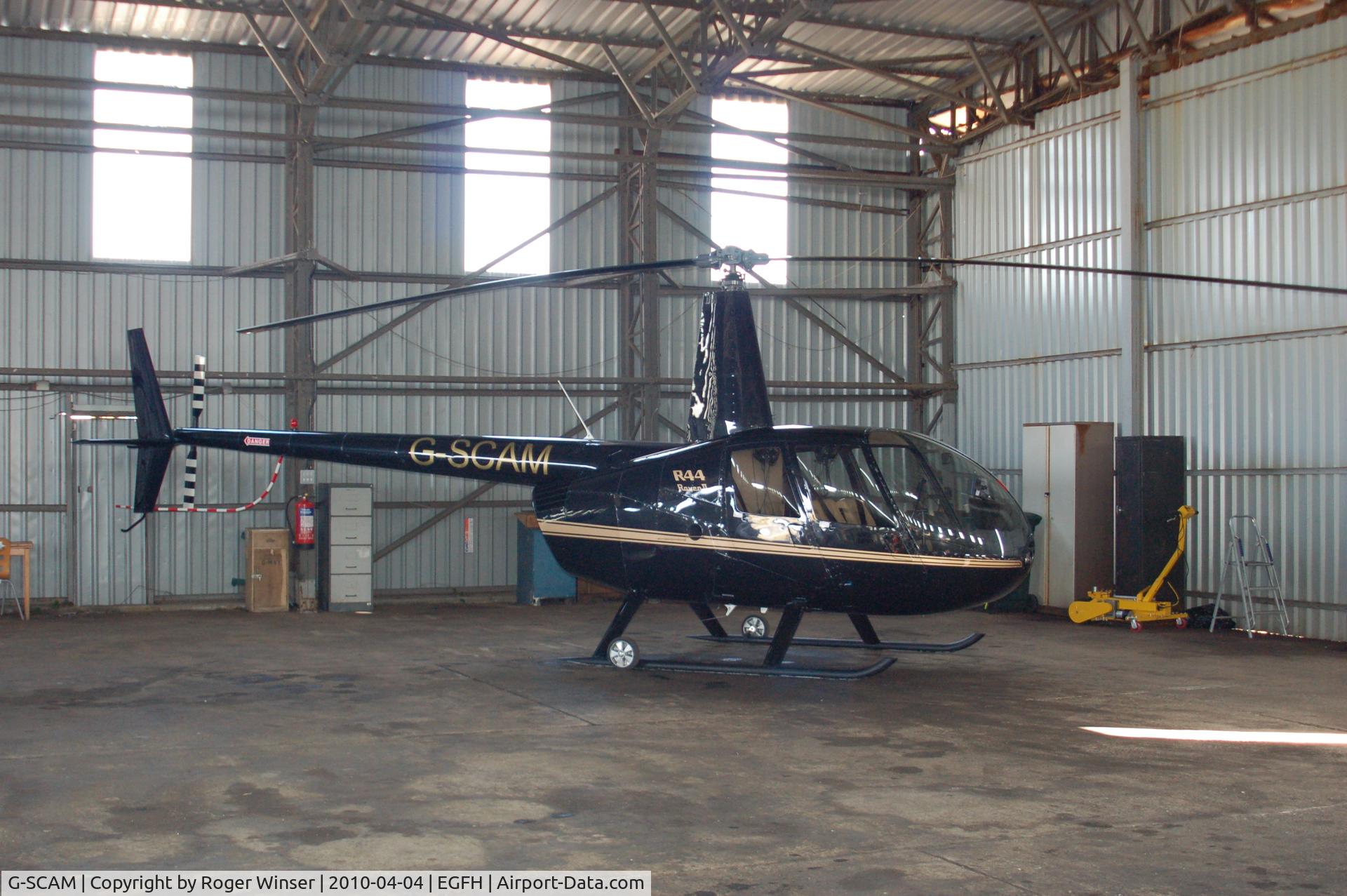 G-SCAM, 2004 Robinson R44 Raven II C/N 10329, Based at Swansea Airport until April 2010. Deregistered on 24th May 2010 and subsequently registered F-OIAS.
