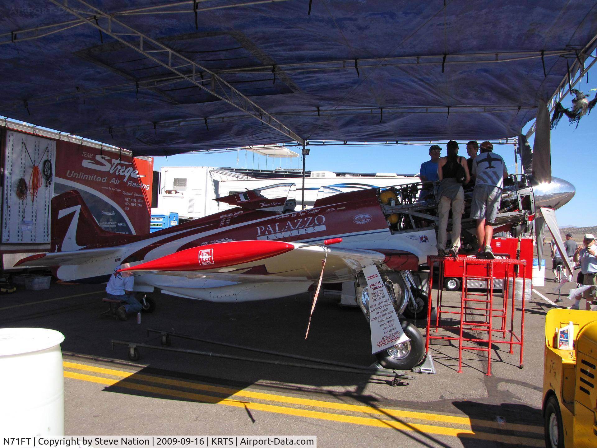 N71FT, 1944 North American P-51D Mustang C/N 00-30, Race #7 P-51D in Unlimited Class @ 2009 Reno Air Races crew working on her Merlin