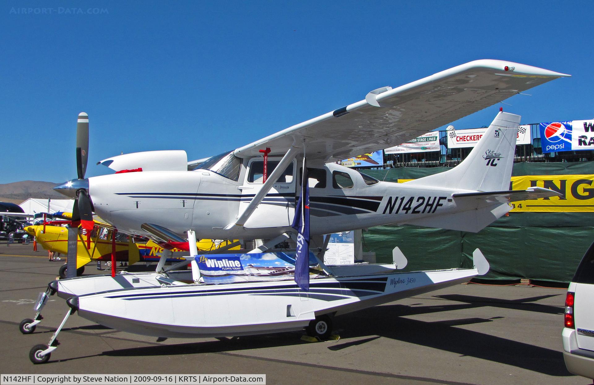 N142HF, 1999 Cessna T206H Turbo Stationair C/N T20608142, 1999 float-equipped Cessna T206H in manufacturers ramp @ 2009 Reno Air Races (taxiing for take-off)