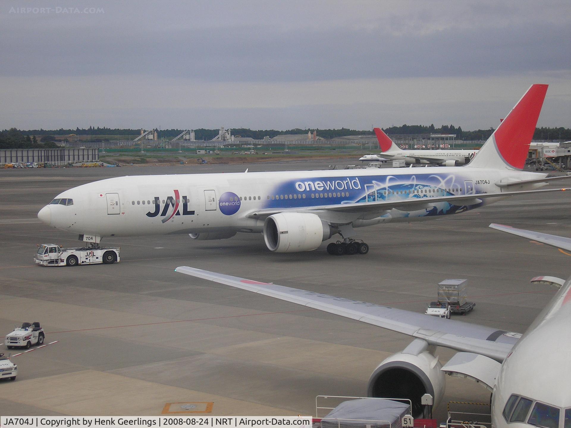 JA704J, 2003 Boeing 777-246/ER C/N 32892, One World cs. Plane just arrived from Amsterdam