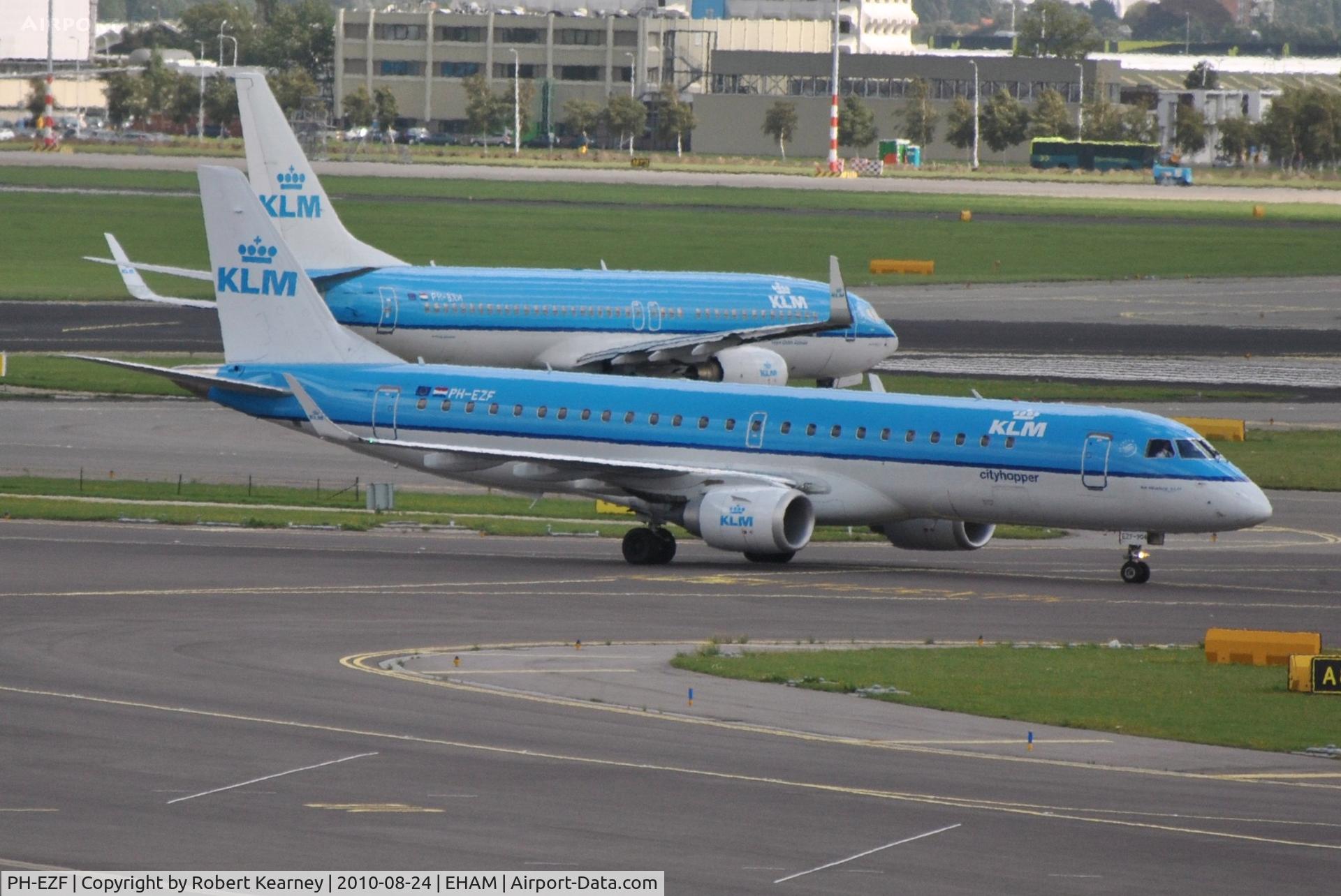 PH-EZF, 2009 Embraer 190LR (ERJ-190-100LR) C/N 19000304, KLM cityhopper taxiing in after arrival