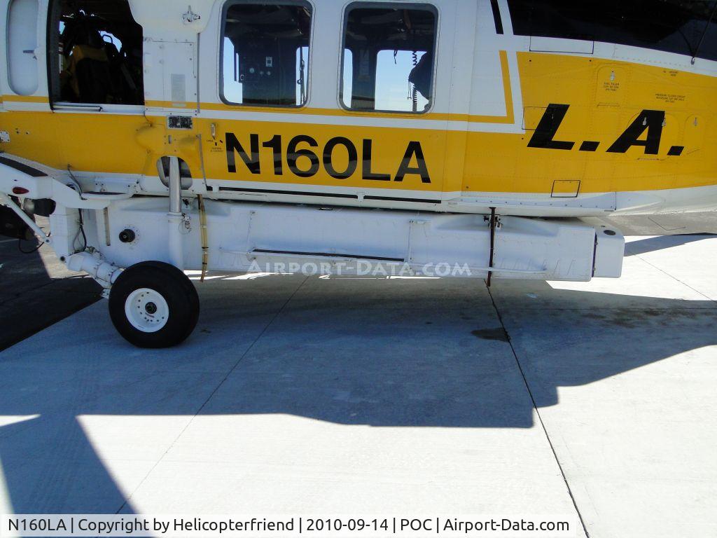 N160LA, 2000 Sikorsky S-70A Firehawk C/N 702453, 1000 gallon water delivery tank