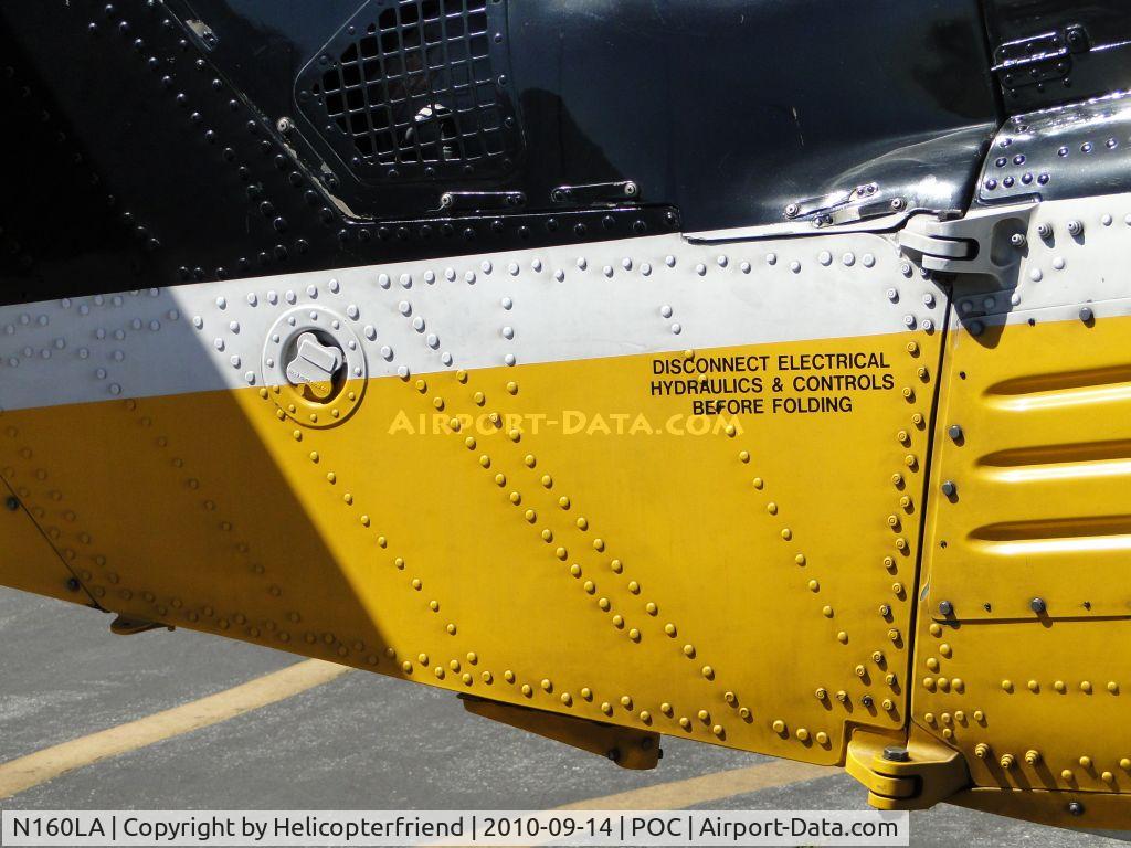 N160LA, 2000 Sikorsky S-70A Firehawk C/N 702453, In case room is needed, after disconnecting all the required items, this tail can be bent in for storage