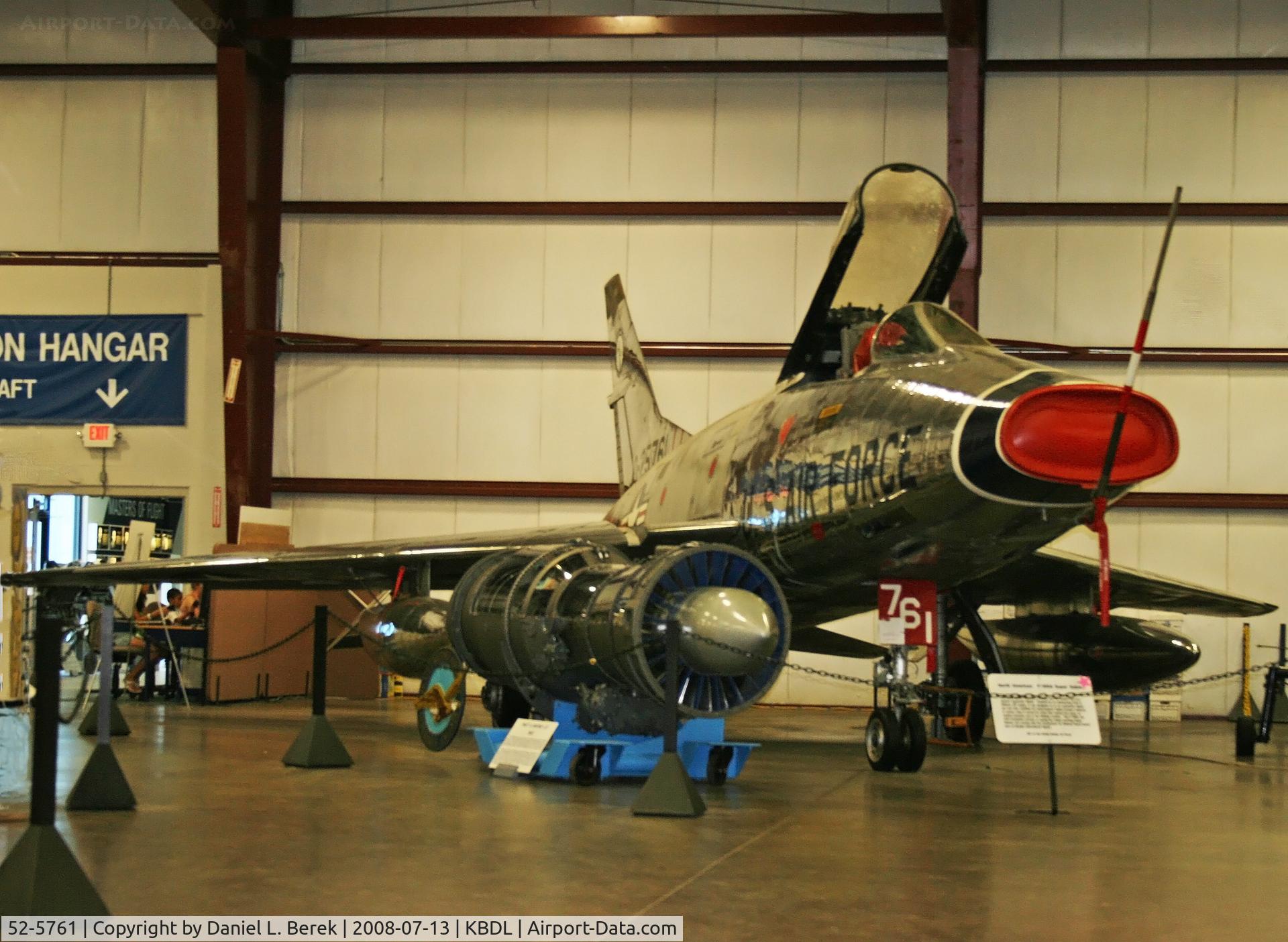 52-5761, 1952 North American F-100A Super Sabre C/N 192-6, Gleaming display at NEAM, accompanied by P&W J-57 engine that powered it