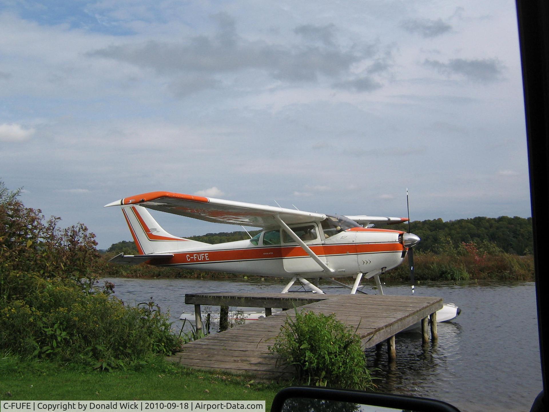 C-FUFE, 1963 Cessna 182F Skylane C/N 18254871, Pic of Plane  at dock on lake