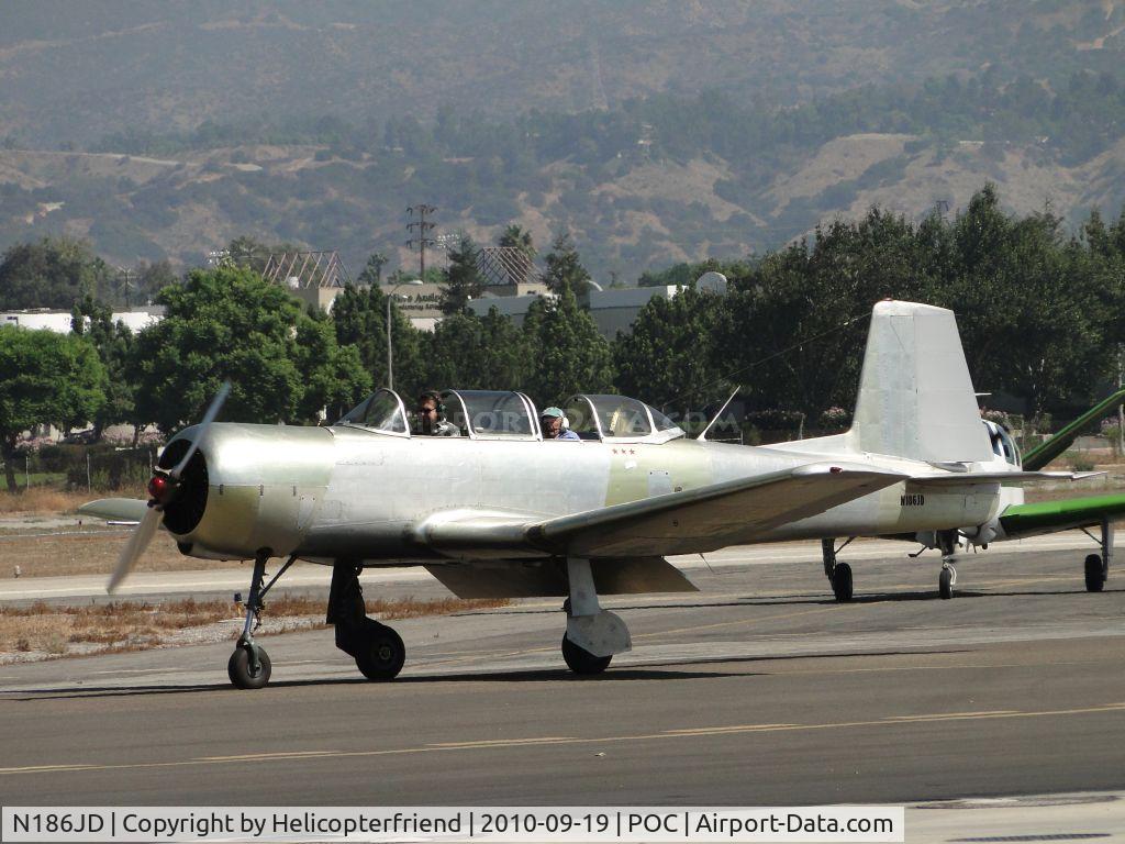 N186JD, 1973 Nanchang CJ-6A C/N 2851250, Taxiing from hanger to display area