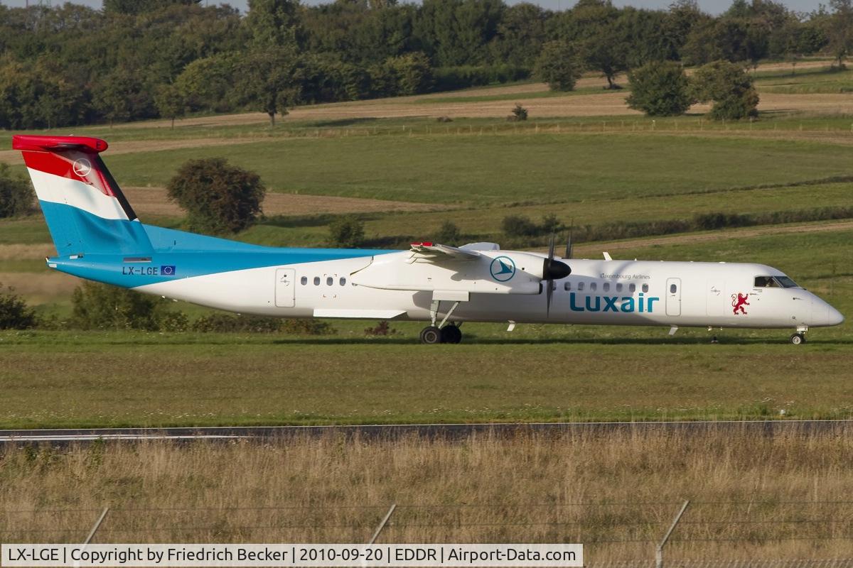 LX-LGE, 2009 De Havilland Canada DHC-8-402Q Dash 8 C/N 4284, taxying to the active