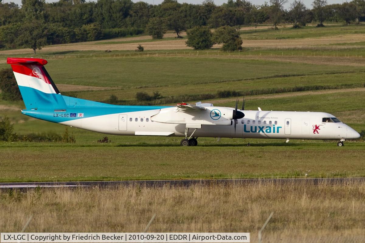 LX-LGC, 2007 De Havilland Canada DHC-8-402Q Dash 8 C/N 4162, taxying to the active