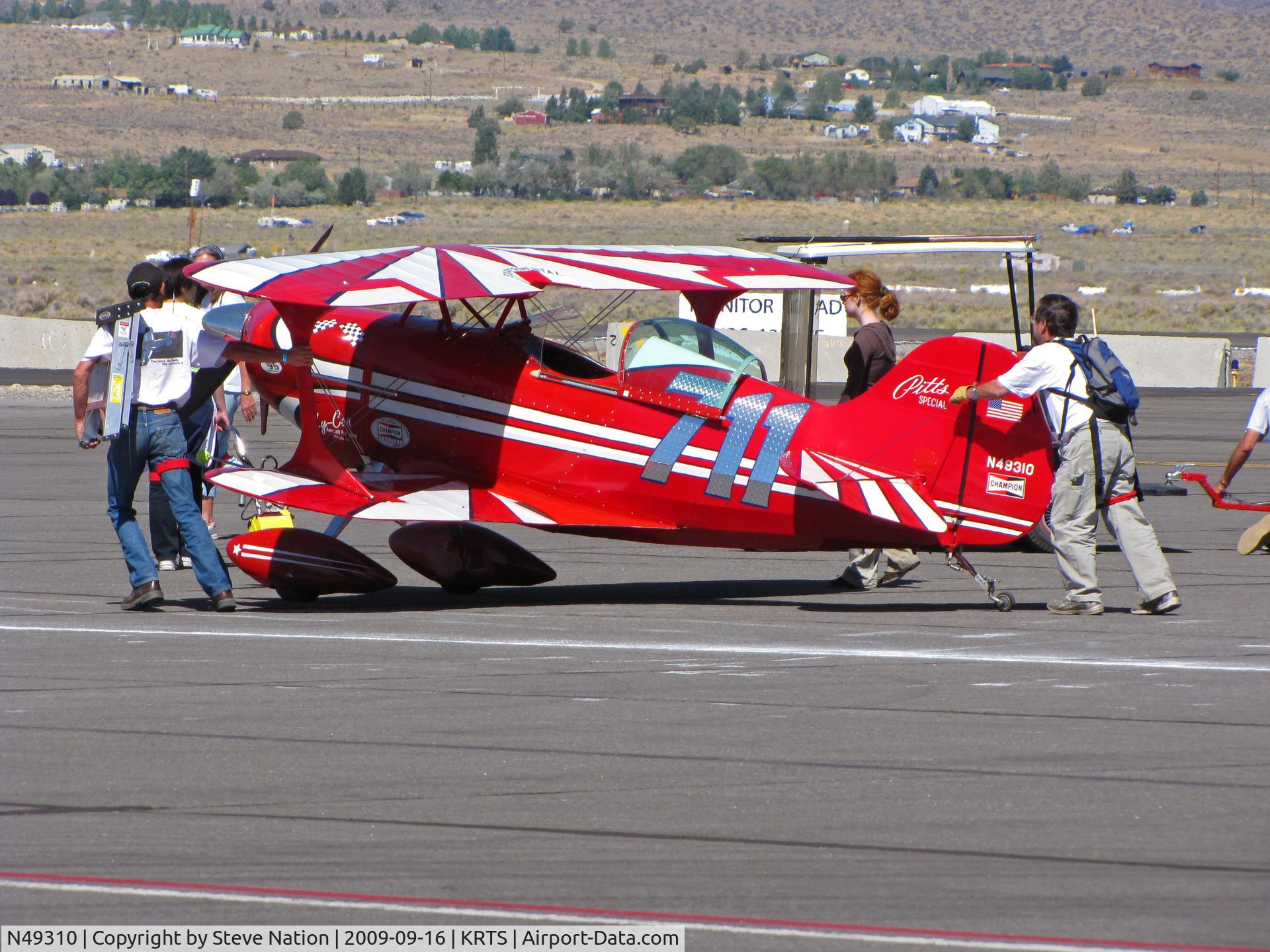 N49310, 1982 Aerotek Pitts S-1S Special C/N KA-103, Race # 711 1982 Aerotek PITTS SPECIAL S-1S getting a push to holding area for second heat of the morning in Biplane Class @ 2009 Reno Air Races