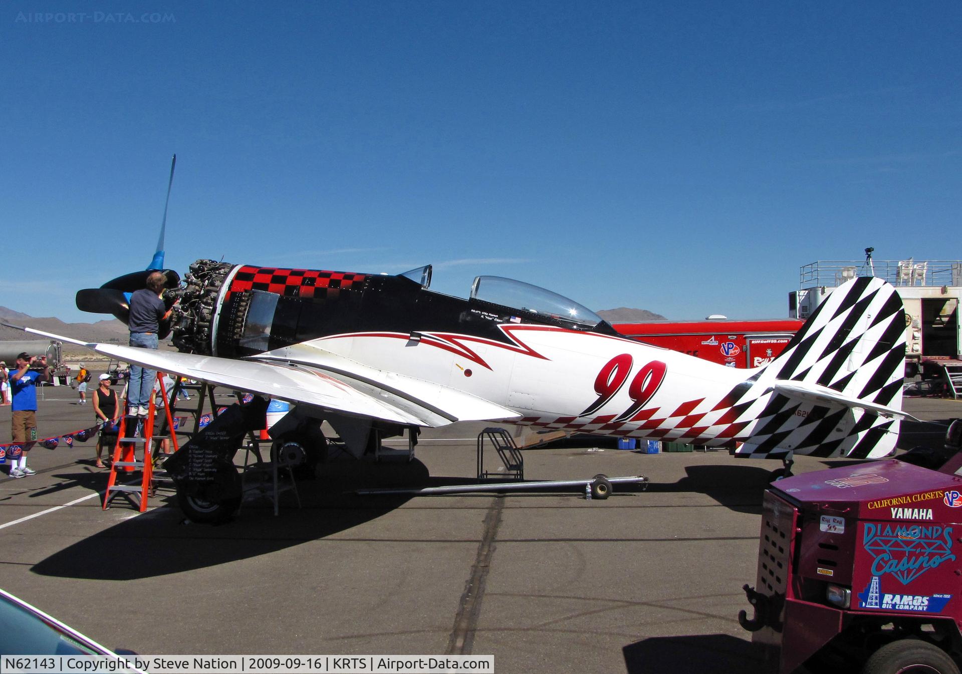 N62143, 1960 Hawker Sea Fury T.20 C/N ES.8509, Race #99 a Sea Fury Mk. T20 (as NX62143) being worked on for upcoming Unlimited Class race in pit area @ 2009 Reno Air Races