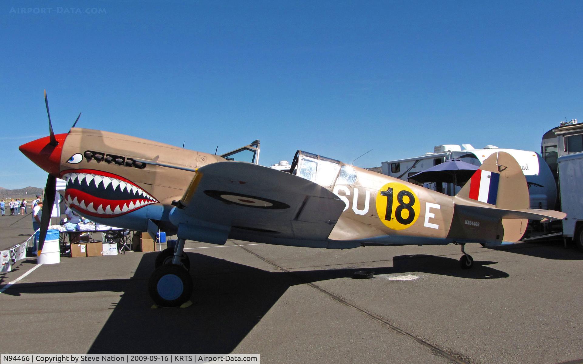 N94466, 1942 Curtiss P-40E C/N AK-899, Race #18 is a shark mouth P-40E (as NX94466) with desert camo and 