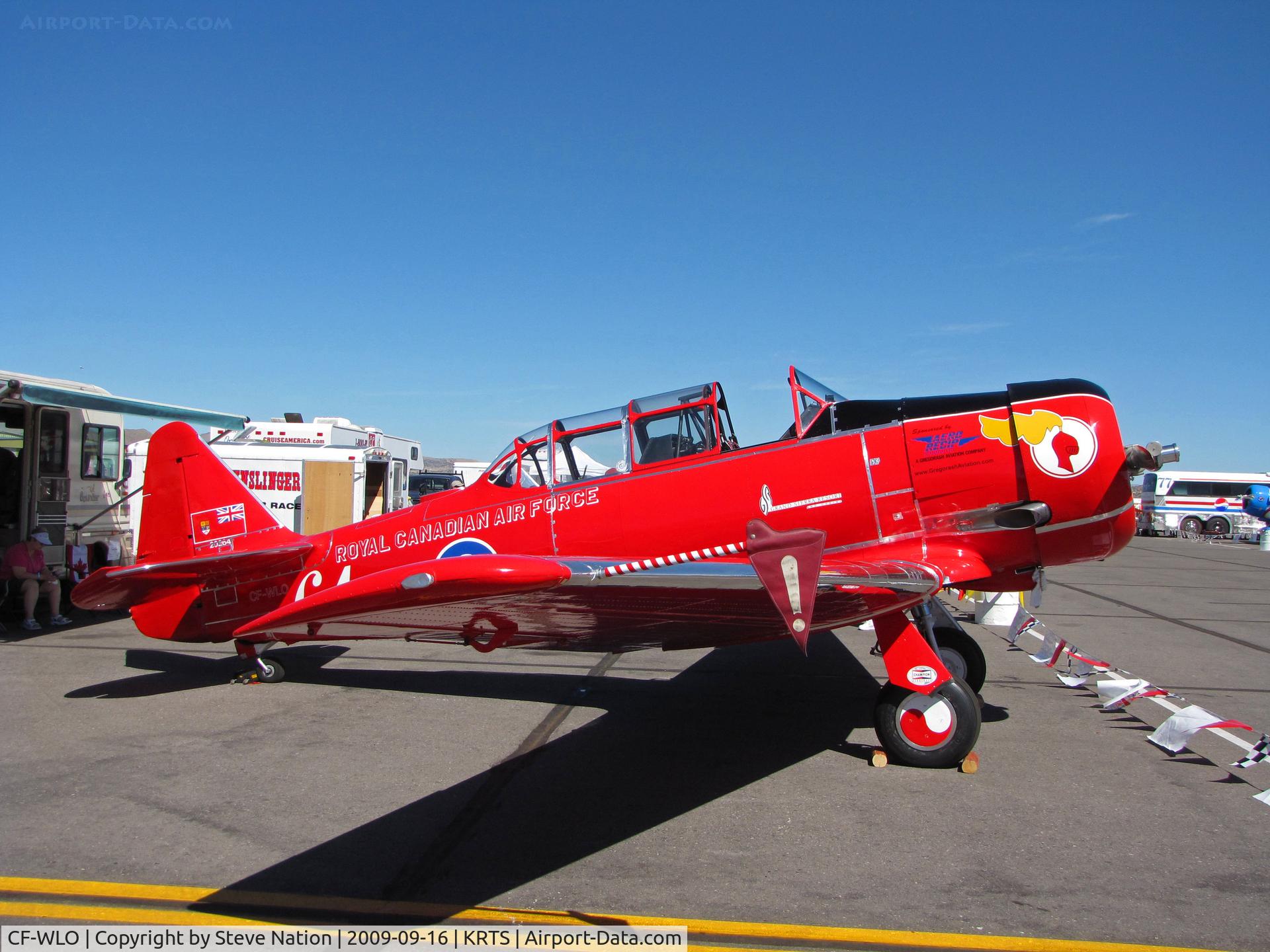 CF-WLO, 1945 Canadian Car & Foundry T-6 Harvard Mk.4 C/N CCF4-55, Race #64 is a CCF Harvard Mk. IV in Royal Canadian Air Force Red Knights colors being readied for T-6 Class racing @ 2009 Reno Air Races