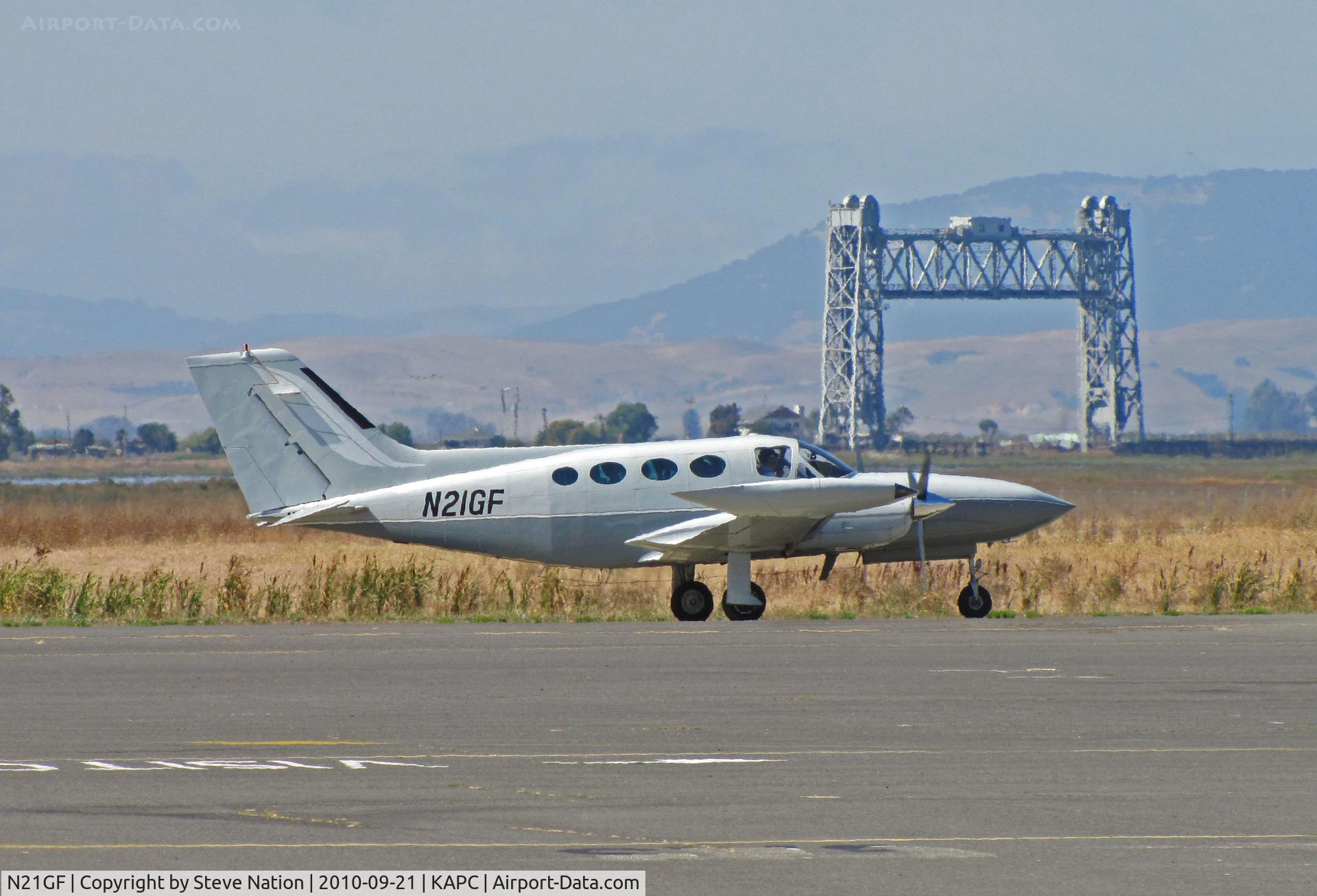 N21GF, 1971 Cessna 421B Golden Eagle C/N 421B-0209, M + D Enterprises 1971 Cessna 421B departing Napa County Airport, CA for KRKS (Sweetwater County Airport, Big Springs, WY) with Napa River RR bridge in background