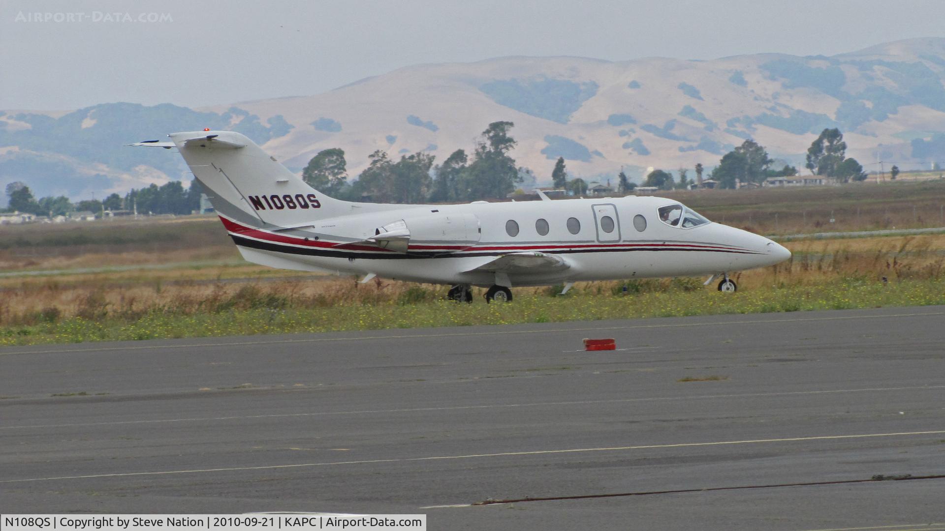 N108QS, 2004 Raytheon Aircraft Company 400A C/N RK-382, Netjets 2004 Raytheon Aircraft Company 400A departing Napa, CA for KCRQ (McClellan-Palomar, Carlsbad, CA) with Napa River RR bridge in background