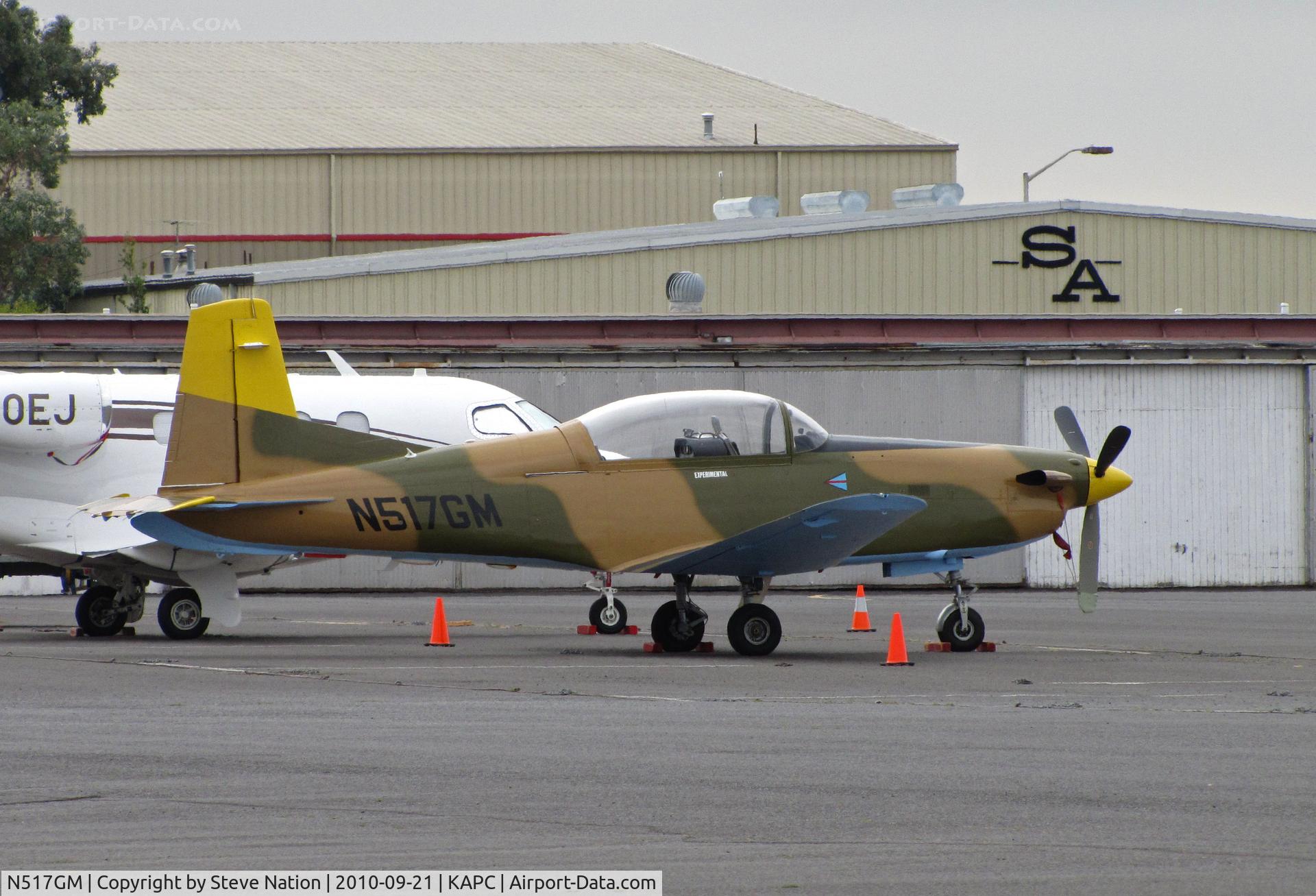 N517GM, 1982 Pilatus PC-7 C/N 395, Vietnam-style camouflaged Spitfire Aviation Pilatus PC-7 on bizjet ramp at Napa, CA (KAPC) in from Monterey, CA (KMRY)