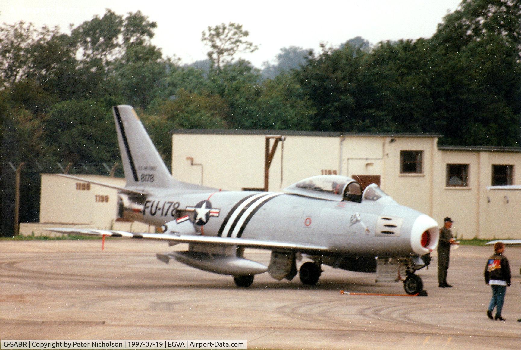 G-SABR, 1948 North American F-86A Sabre C/N 151-083 (151-43547), F-86A Sabre 48-0178 on the flight-line at the 1997 Intnl Air Tattoo at RAF Fairford.