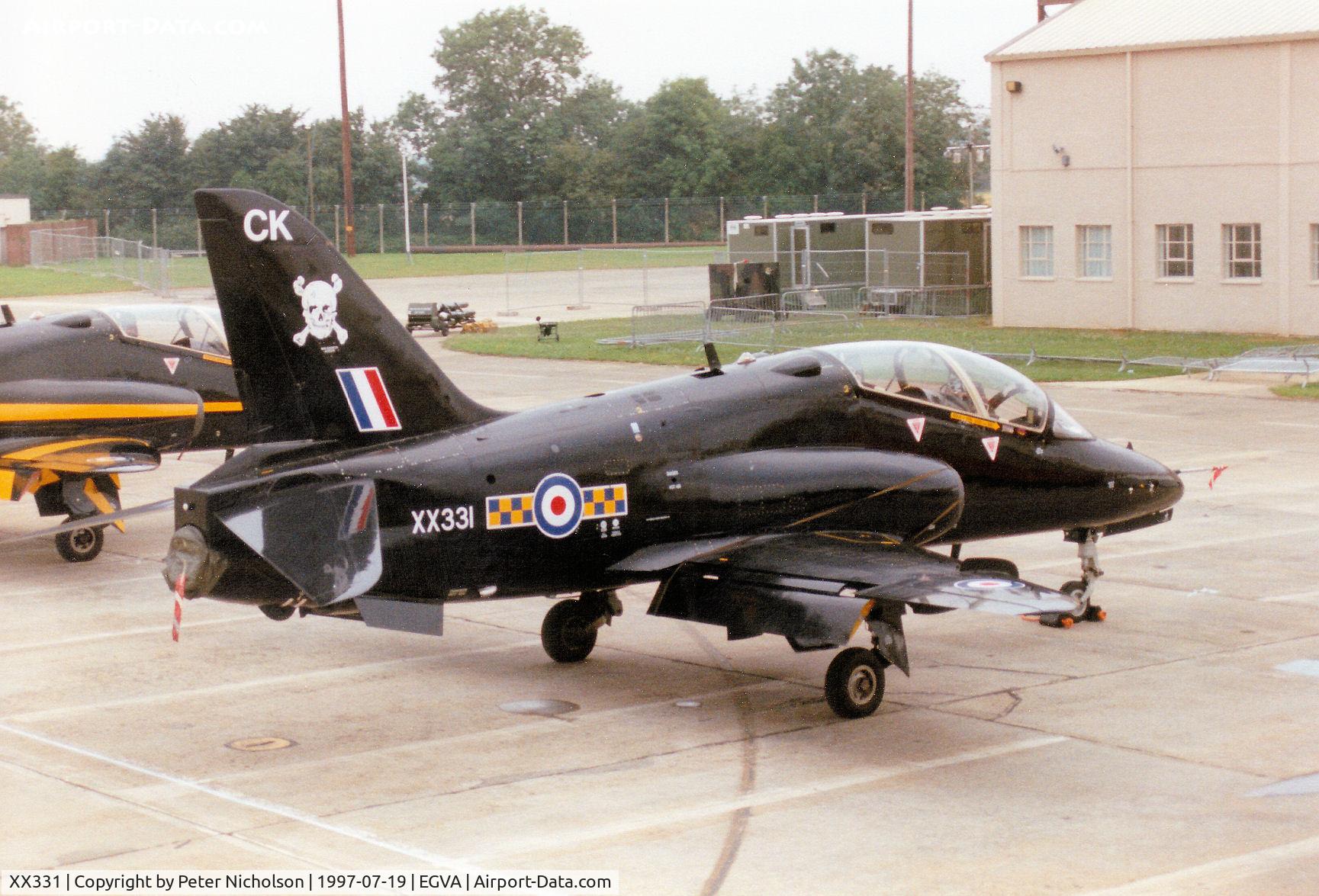 XX331, 1980 Hawker Siddeley Hawk T.1A C/N 177/312155, Hawk T.1A, callsign Archer, of RAF Leeming's 100 Squadron on the flight-line at the 1997 Intnl Air Tattoo at RAF Fairford.