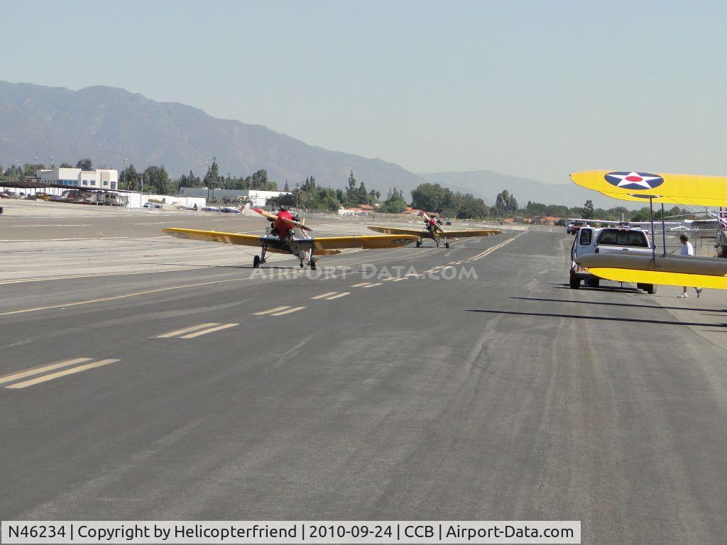 N46234, 1941 Ryan Aeronautical ST3KR C/N 1074, N46234 and N56026 taxiing to hangers