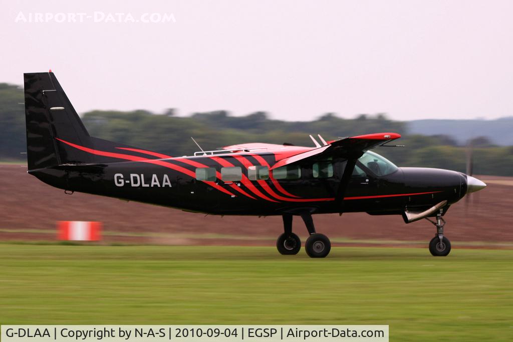 G-DLAA, 2003 Cessna 208 Caravan I C/N 20800367, Landing after another drop