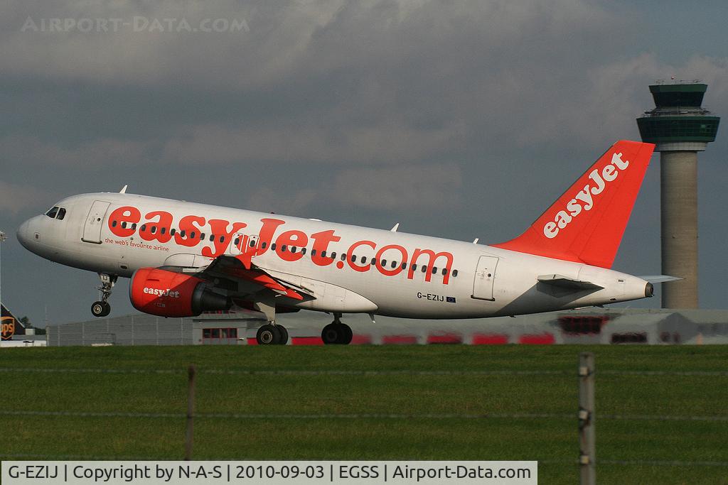 G-EZIJ, 2005 Airbus A319-111 C/N 2477, Lifting off