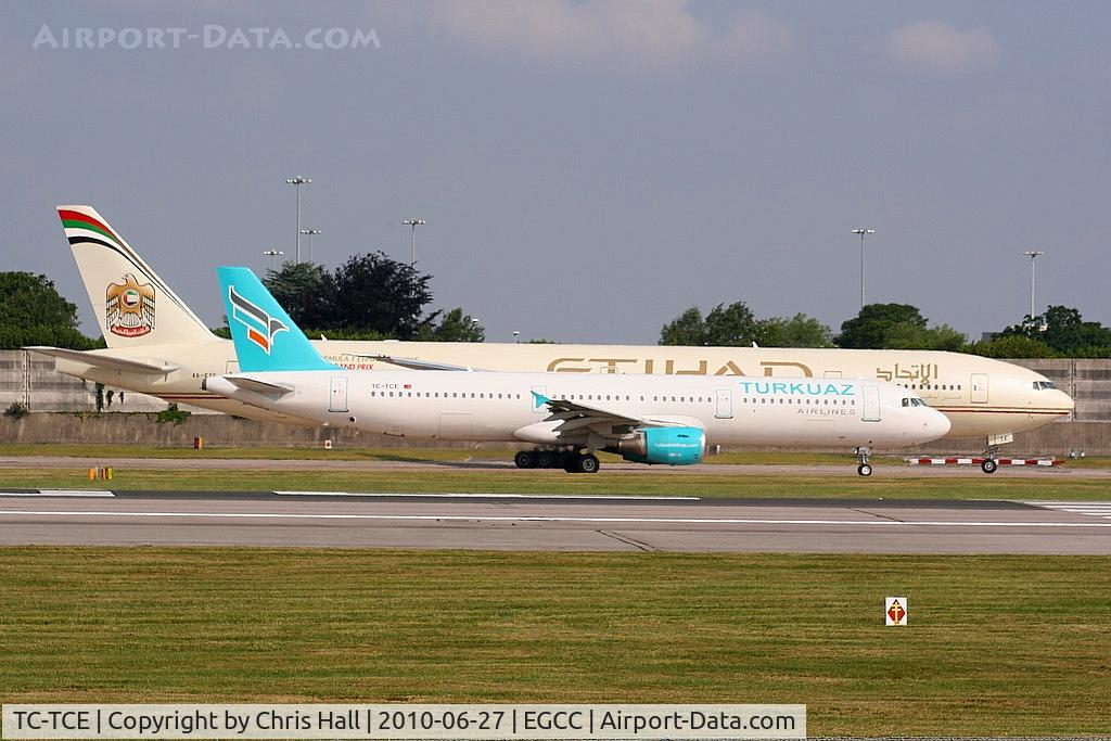 TC-TCE, 1997 Airbus A321-211 C/N 666, Turkuaz Airlines A321 taxying past Etihad B777 A6-ETF
