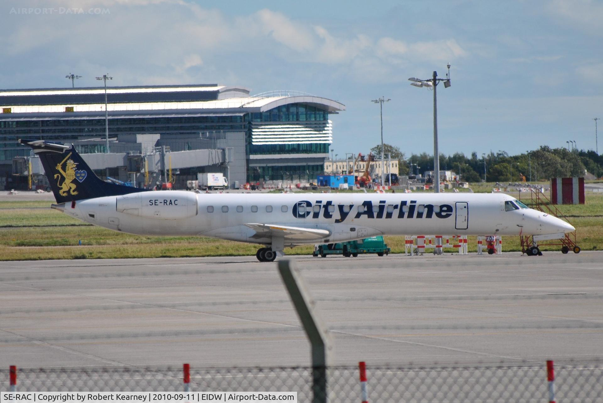 SE-RAC, 1998 Embraer ERJ-145LR (EMB-145LR) C/N 145098, Parked on remote stand
