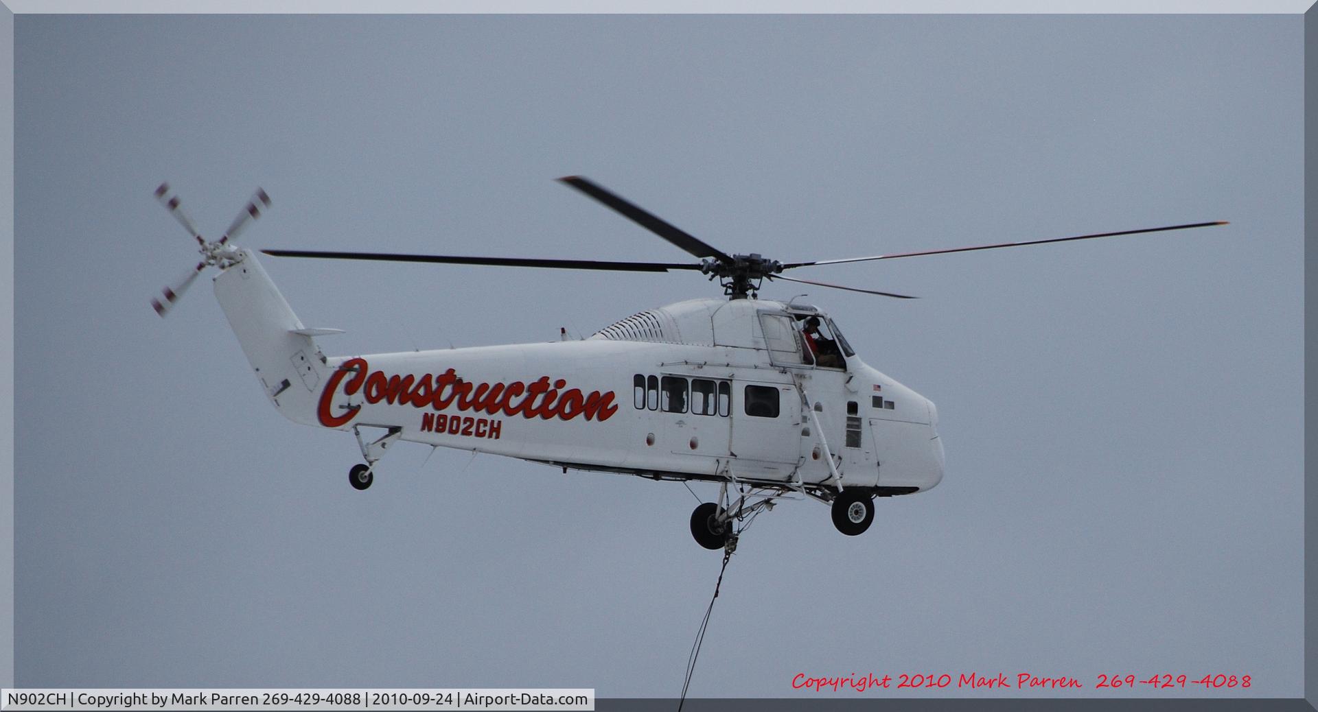 N902CH, 1962 Sikorsky S-58JT C/N 58-1539, Setting AC units on Meijer's of Stevensville, MI