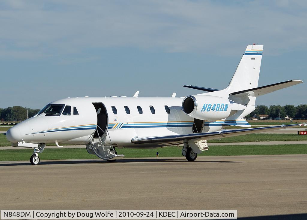 N848DM, 2003 Cessna 560XL Citation Excel C/N 560-5329, Archer Daniels Midland corporate jet with engines running outside of its Decatur, Illinois hanger.