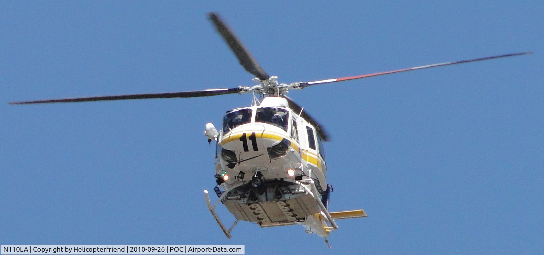 N110LA, 2005 Bell 412EP C/N 36392, Crossing runways enroute to downwind lae for landing at helipad