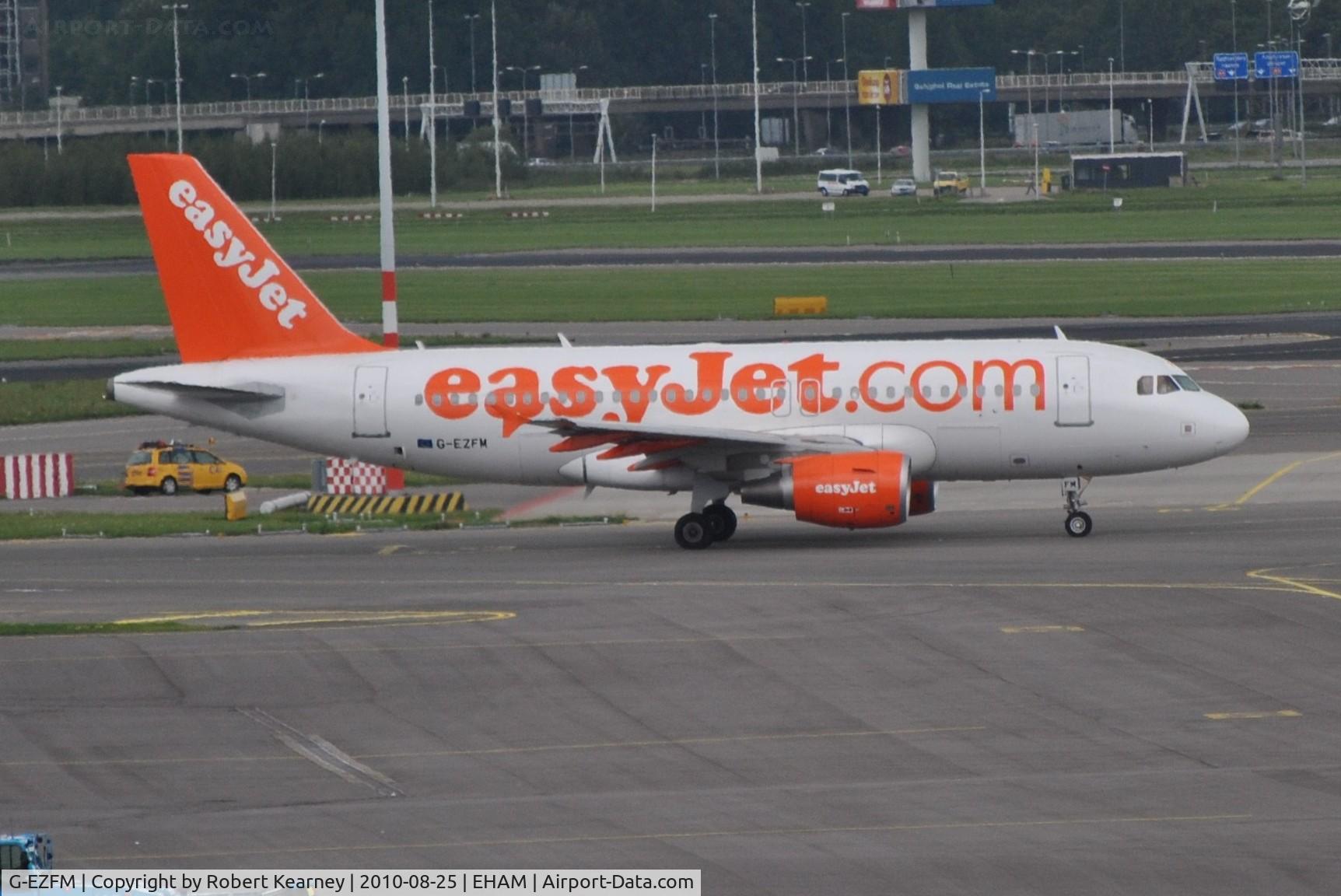 G-EZFM, 2009 Airbus A319-111 C/N 4069, And another EasyJet taxiing for departure