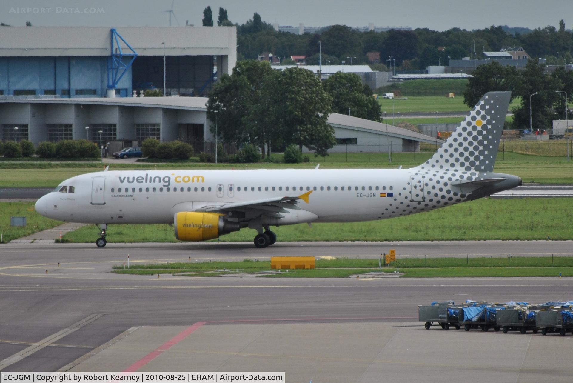 EC-JGM, 2005 Airbus A320-214 C/N 2407, One of many Vueling flights taxiing out for departure
