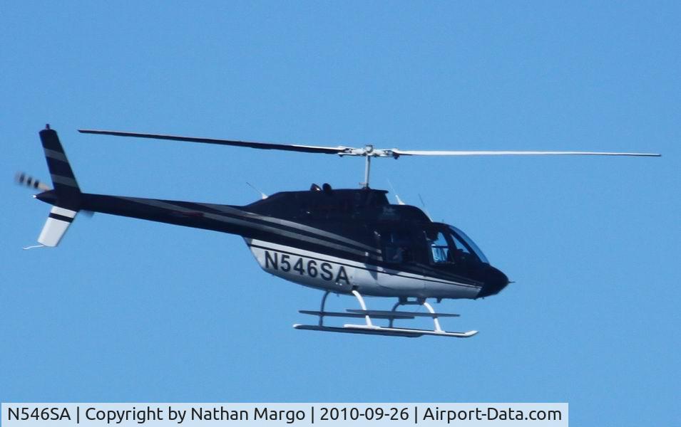 N546SA, 1976 Bell 206B C/N 1939, Seen flying North over Ocean Beach Pier, San Diego, California.