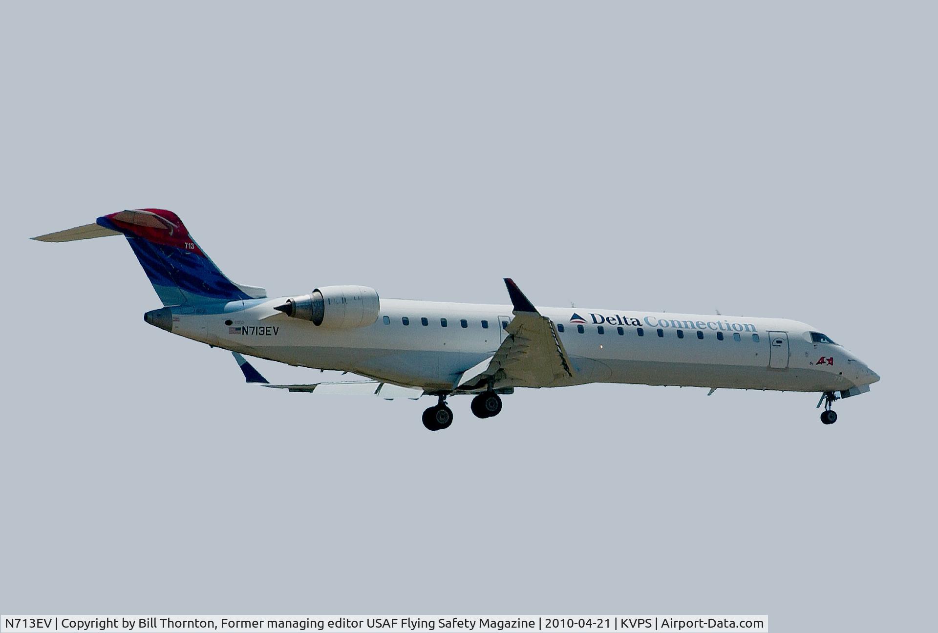 N713EV, 2003 Bombardier CRJ-701 (CL-600-2C10) Regional Jet C/N 10081, The Delta Connection, Final, Rwy 30@VPS. (an f-stop 5.6 photograph)