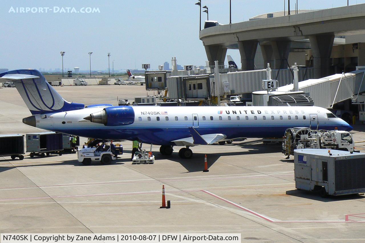 N740SK, 2005 Bombardier CRJ-701 (CL-600-2C10) Regional Jet C/N 10196, United Express at the gate - DFW Airport, TX