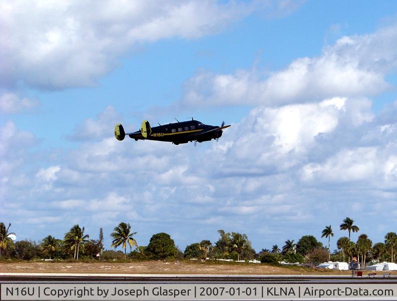 N16U, 1958 Beech E18S C/N BA-394, Beech E18S Taking off for the Islands
Copyright