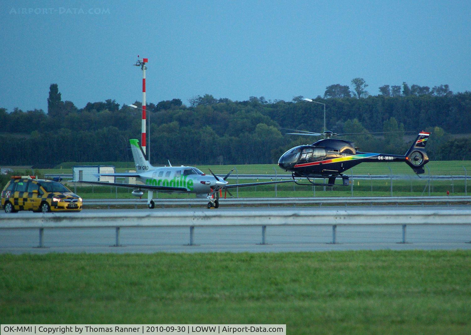 OK-MMI, 2003 Eurocopter EC-120B Colibri C/N 1358, Eurocopter EC-120 followingthe followme-car along taxiway like a plane