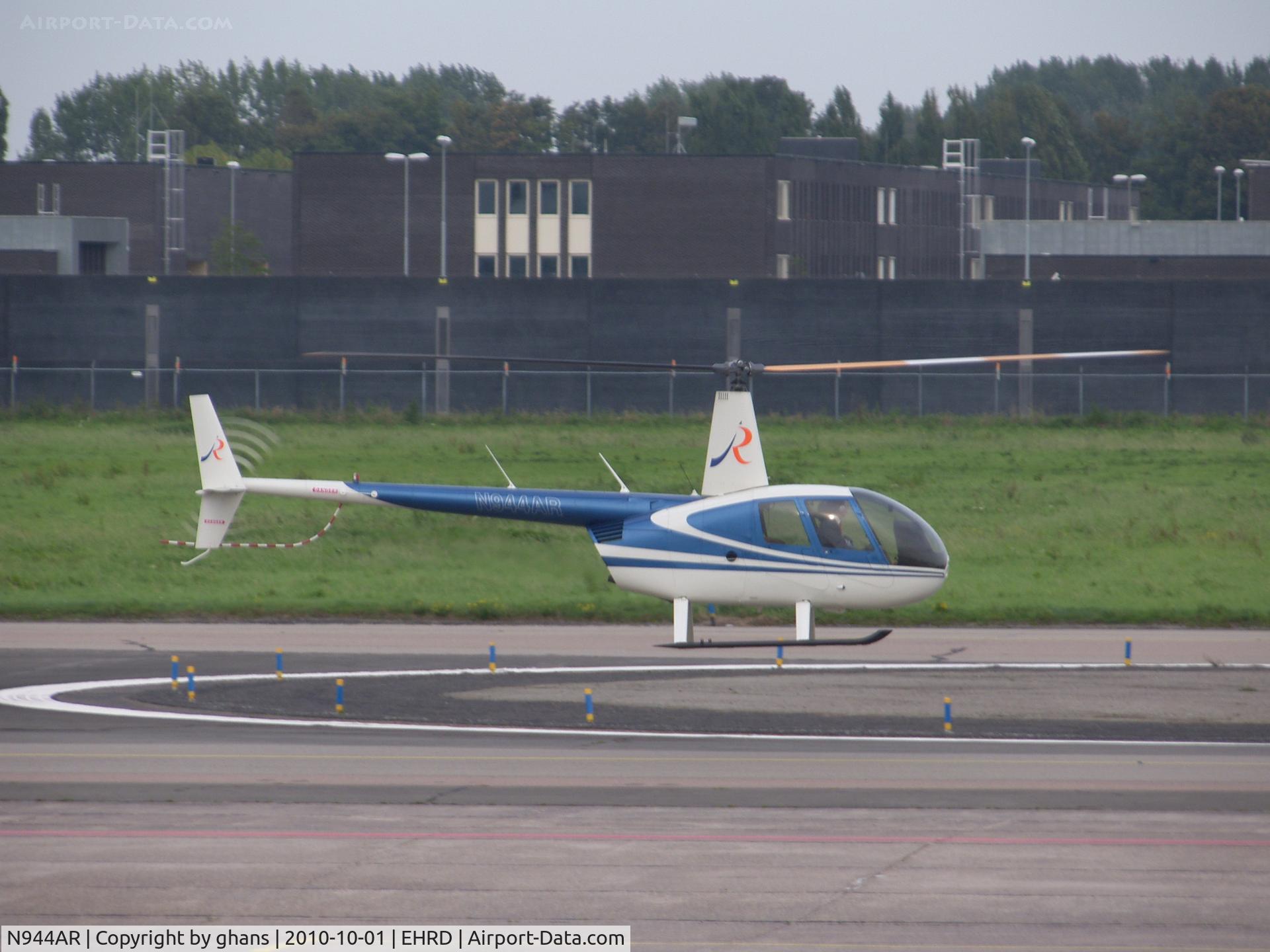 N944AR, Robinson R44 II C/N 12543, hoovering to the jetcentre