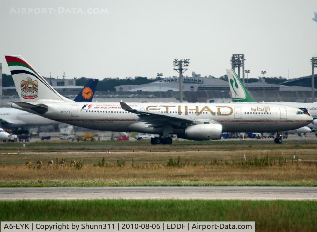 A6-EYK, 2006 Airbus A330-243 C/N 788, Taking off rwy 07L... Sorry for the heat distortion :|