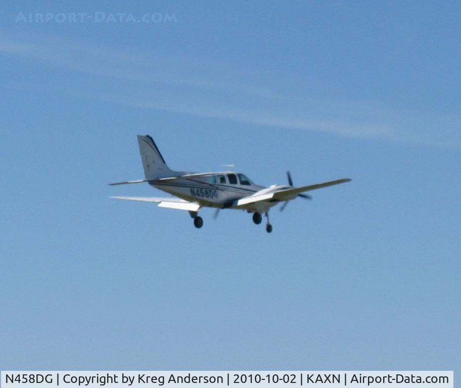 N458DG, 1973 Beech 58 Baron C/N TH-296, Sorry for the poor photo, it was taken as I was driving. This Beech 58 Baron is landing on runway 31.