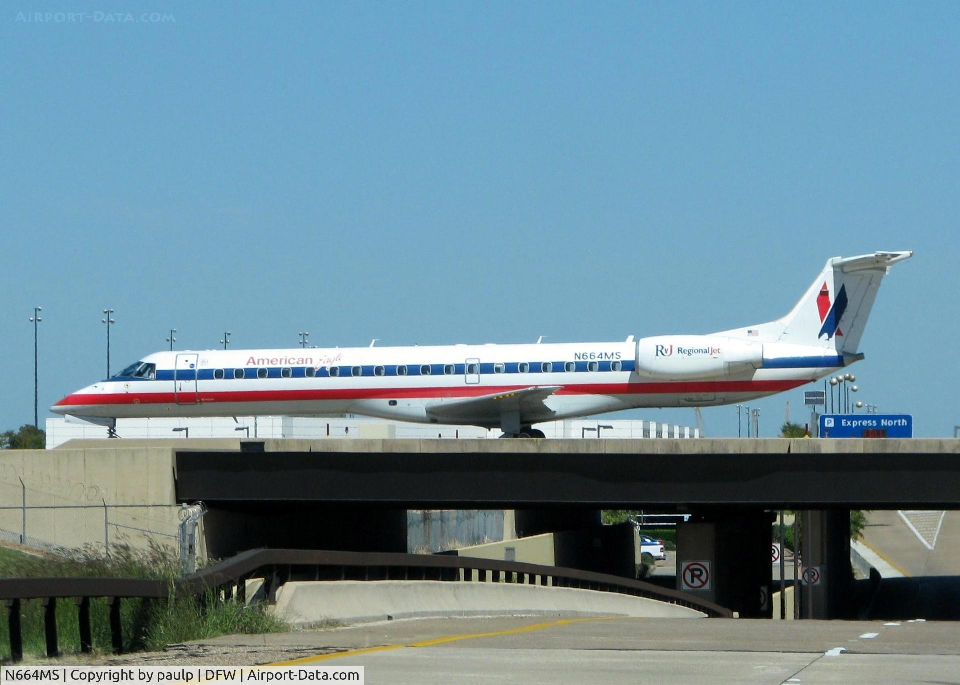N664MS, 2004 Embraer ERJ-145LR (EMB-145LR) C/N 145779, Crossing over the road at DFW.
