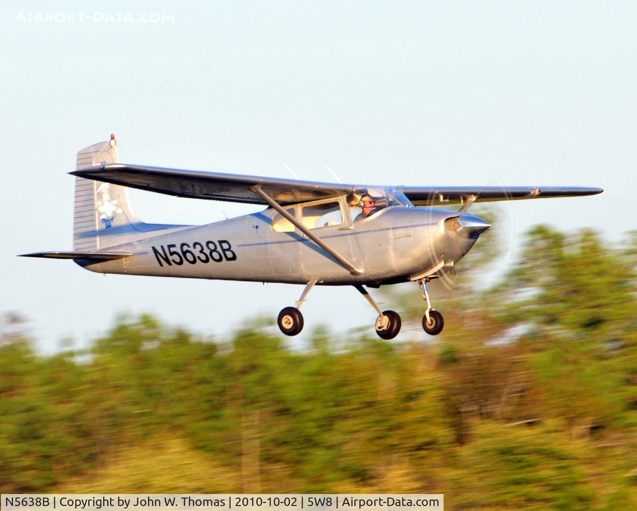 N5638B, 1956 Cessna 182 Skylane C/N 33638, .low pass runway 22