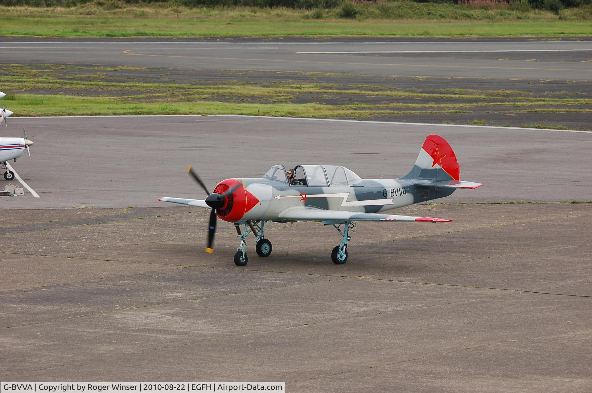 G-BVVA, 1987 Bacau Yak-52 C/N 877610, Returning from formation practice.