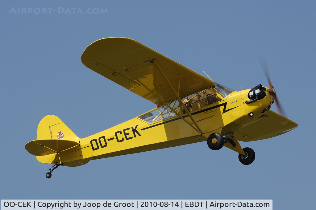 OO-CEK, 1944 Piper L-4J Grasshopper (J3C-65D) C/N 12760, departure from the 2010 oldtimer fly-in.
