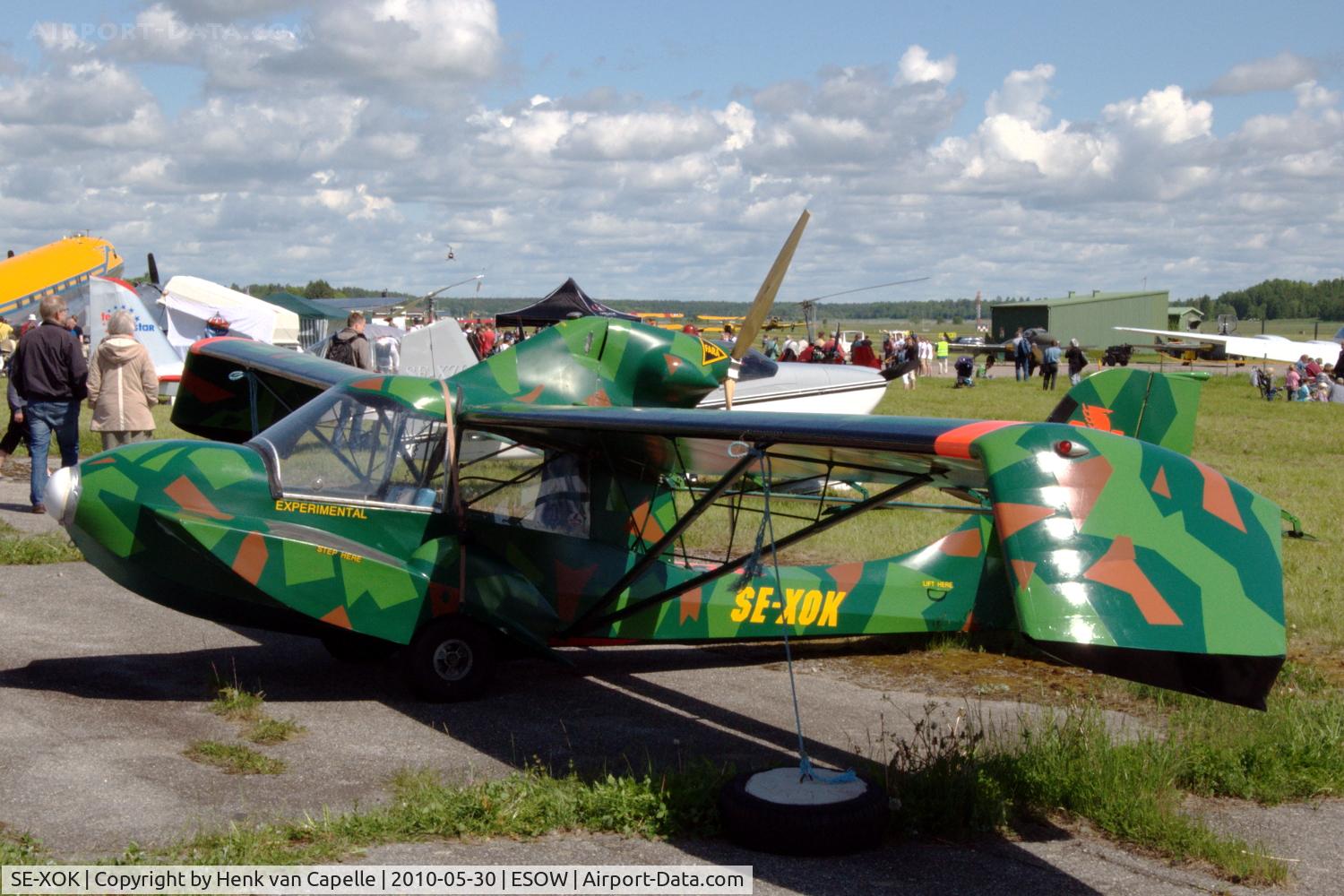 SE-XOK, 1993 Avid Amphibian C/N 84A-807, An Avid Amphibian parked at Västerås Hässlö airport, Sweden. Although the aircraft is well camouflaged it did not escape attention during the Roll-out air show.