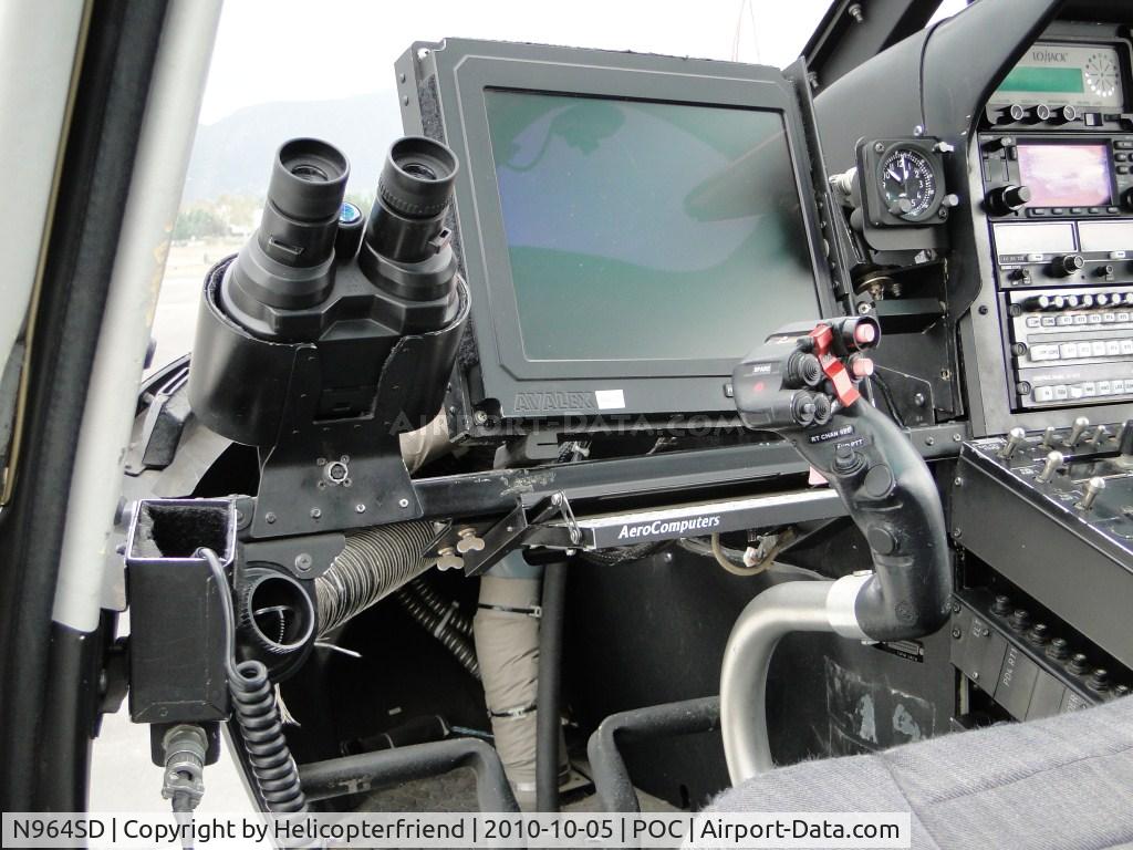 N964SD, Eurocopter AS-350B-2 Ecureuil Ecureuil C/N 3529, FTO side of the ship with binoculars and computer