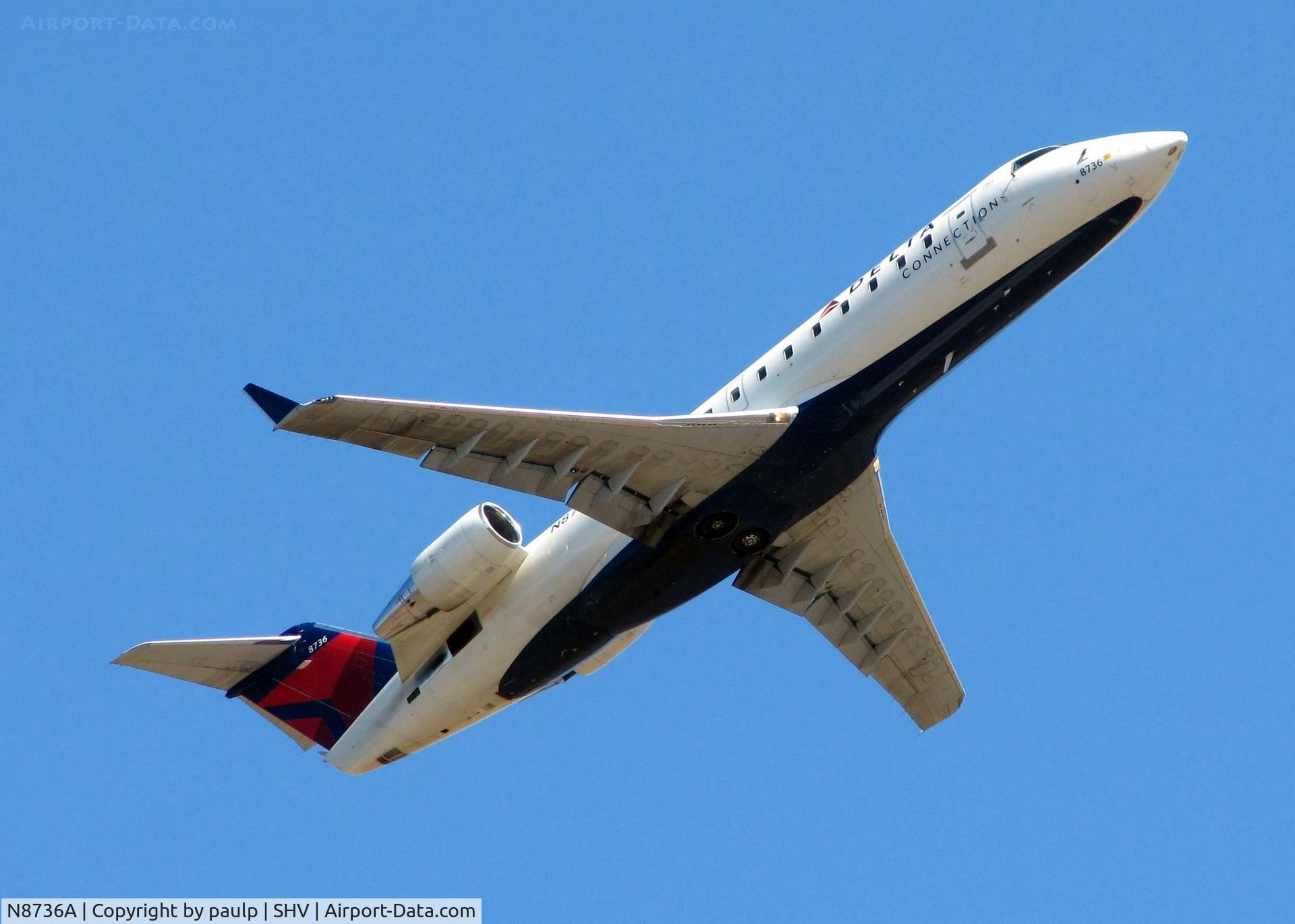 N8736A, 2003 Canadair CRJ-440 (CL-600-2B19) Regional Jet C/N 7736, Off of 14 at Shreveport Regional.